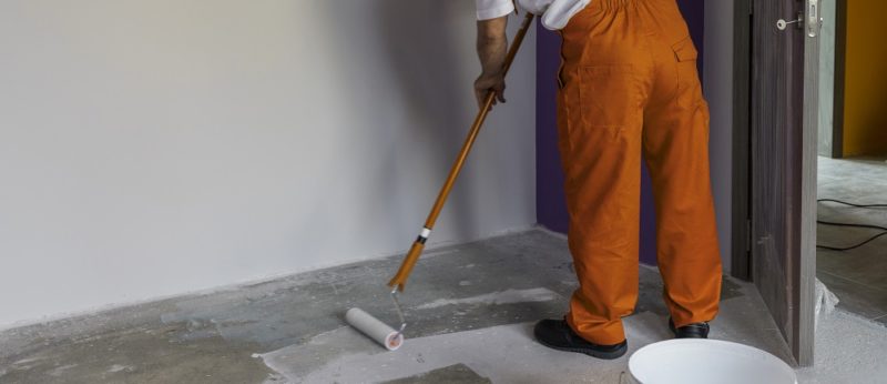 Applying Wonderbond Concrete Sealer to concrete floor 800x346